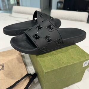 Gucci Black Rubber GG Slide Sandals